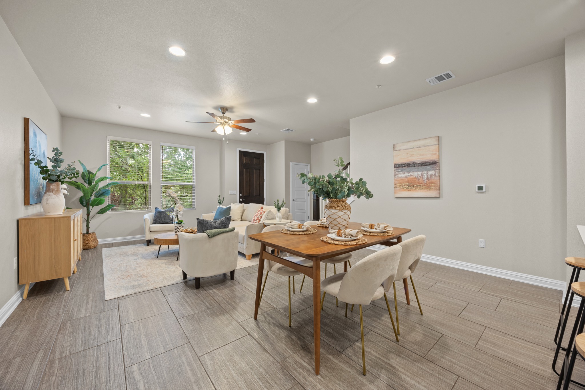 6814 East Riverside Drive, Unit 104 Austin, TX 78741 - Photo 12 of 37 a view of a dining room with furniture window and wooden floor