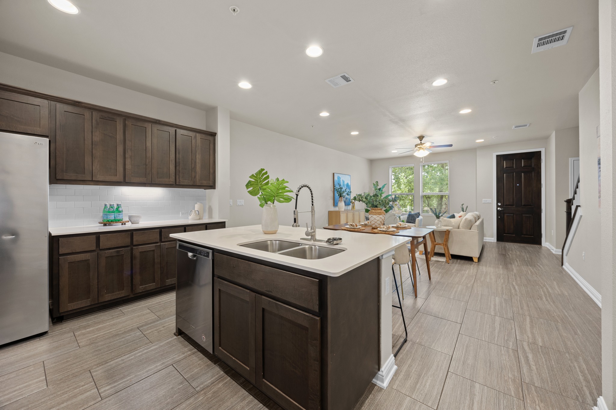 6814 East Riverside Drive, Unit 104 Austin, TX 78741 - Photo 14 of 37 a kitchen with a sink and cabinets
