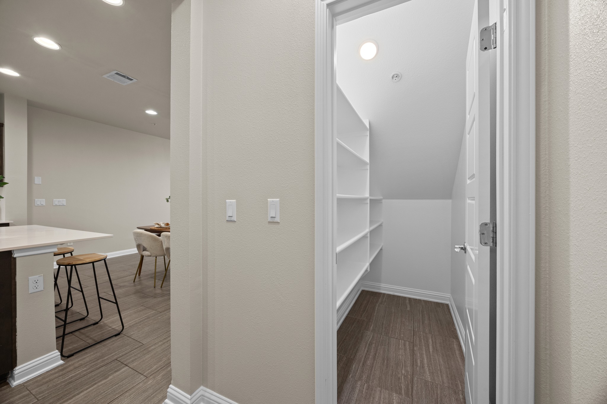 6814 East Riverside Drive, Unit 104 Austin, TX 78741 - Photo 16 of 37 a view of a hallway with wooden floor and a cabinet