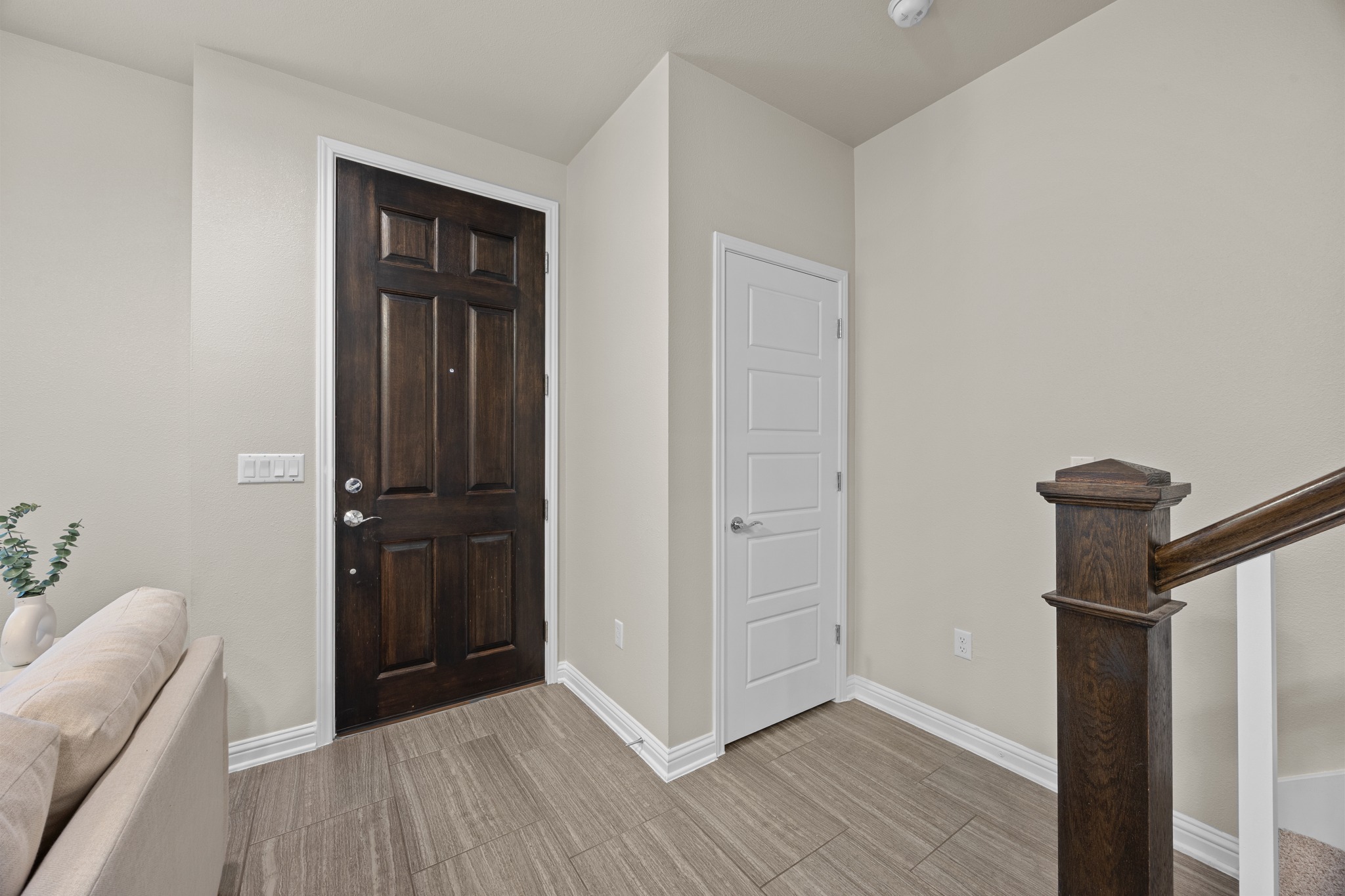 6814 East Riverside Drive, Unit 104 Austin, TX 78741 - Photo 18 of 37 a view of hallway with furniture and wooden floor