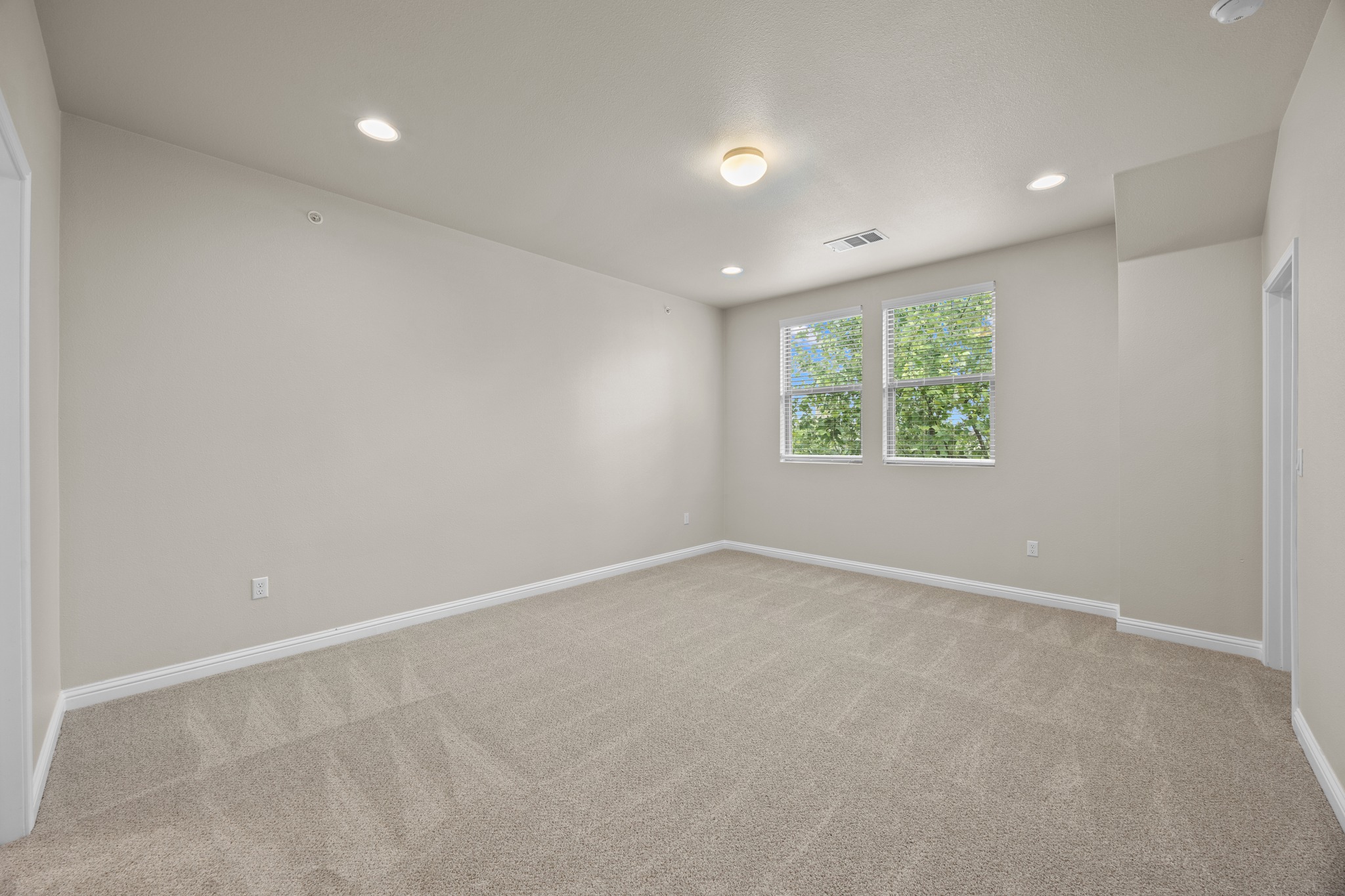 6814 East Riverside Drive, Unit 104 Austin, TX 78741 - Photo 21 of 37 an empty room with windows