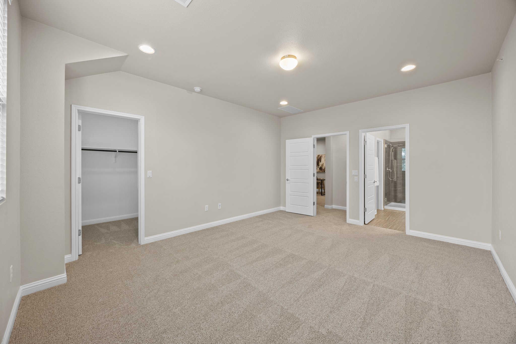 6814 East Riverside Drive, Unit 104 Austin, TX 78741 - Photo 22 of 37 an empty room with closet and a window