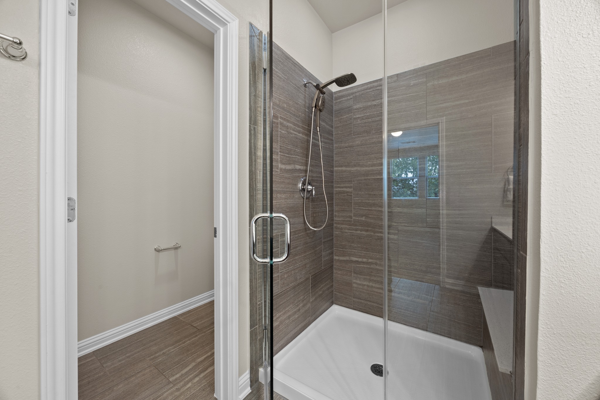 6814 East Riverside Drive, Unit 104 Austin, TX 78741 - Photo 25 of 37 a bathroom with a shower and a bathtub