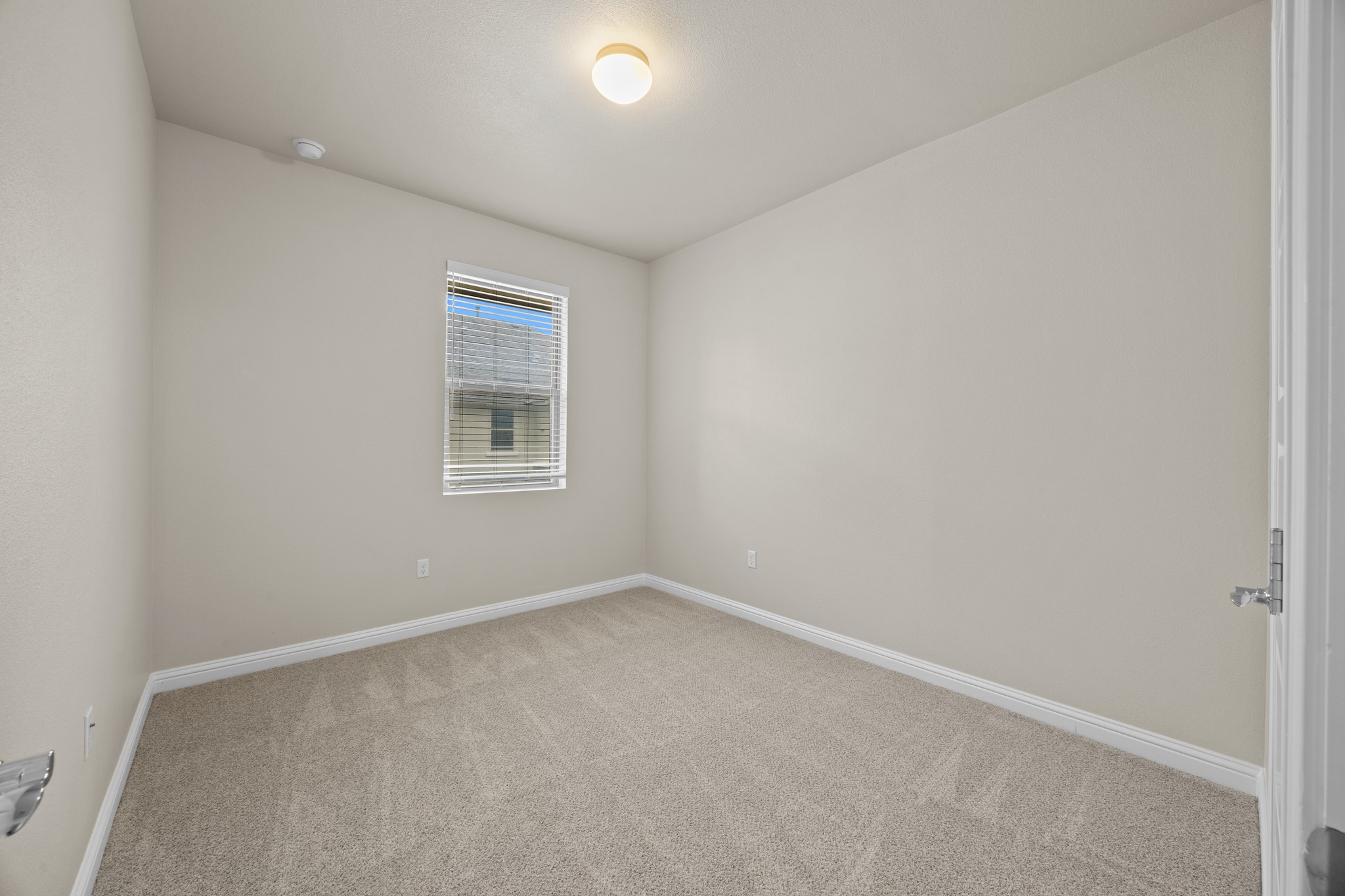 6814 East Riverside Drive, Unit 104 Austin, TX 78741 - Photo 31 of 37 an empty room with a window