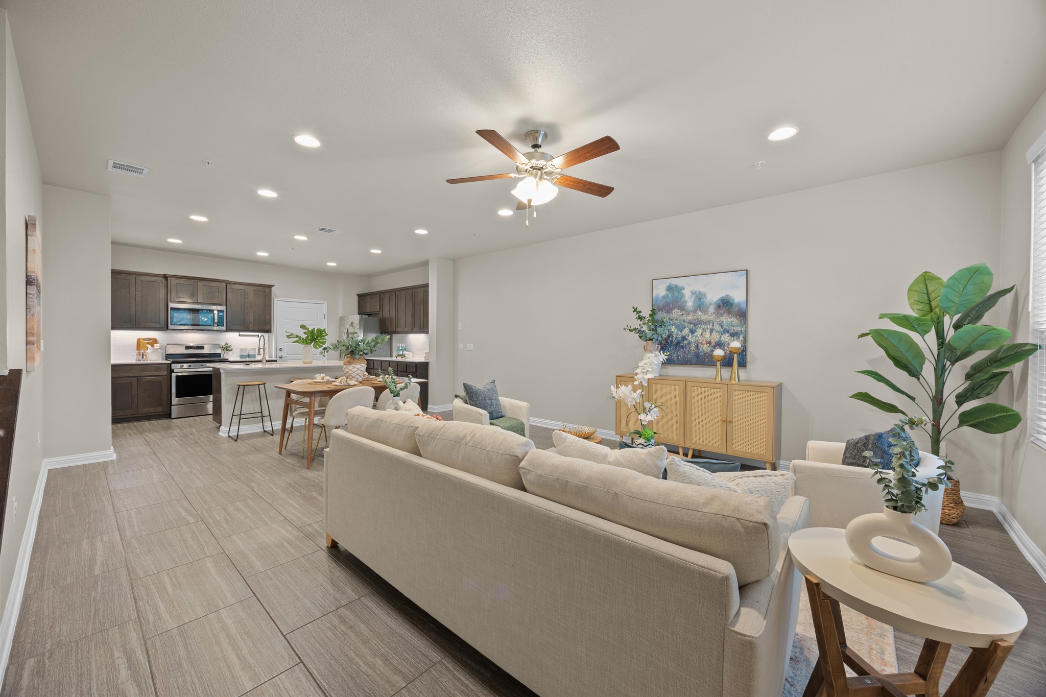 6814 East Riverside Drive, Unit 104 Austin, TX 78741 - Photo 8 of 37 a living room with furniture and kitchen view