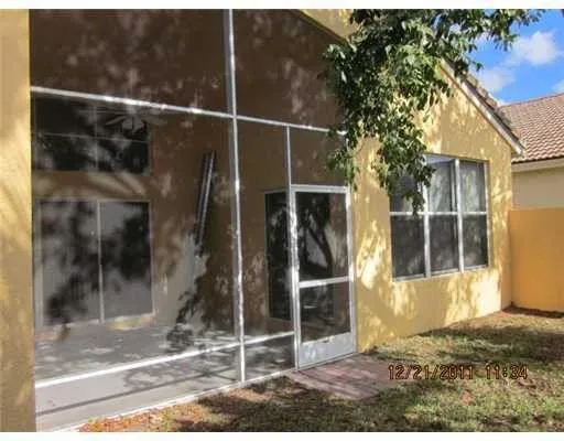 a front view of a house with a porch