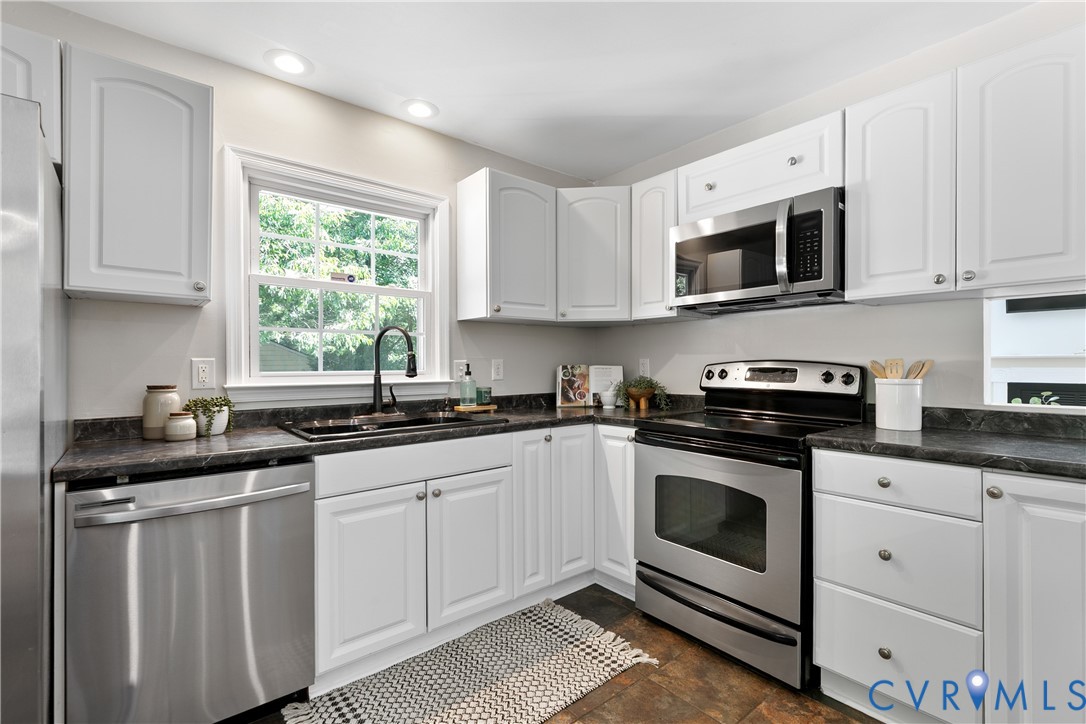 3114 Shiloh Church Road Midlothian, VA 23112 - Photo 12 of 34 Updated kitchen featuring white shaker-style cabin