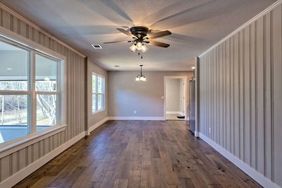 750 Sunnyside Road Hiawassee, GA 30546 - Photo 11 of 46 wooden floor in an empty room with a window