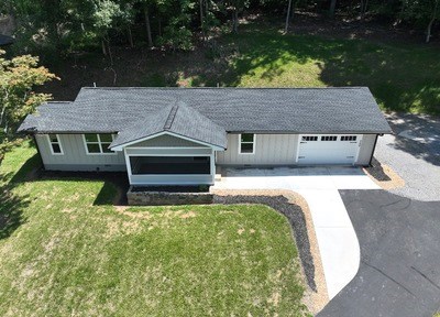 750 Sunnyside Road Hiawassee, GA 30546 - Photo 2 of 46 aerial view of a house with a yard