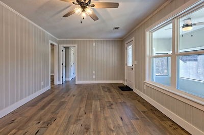750 Sunnyside Road Hiawassee, GA 30546 - Photo 25 of 46 a view of an empty room with a window and wooden floor