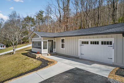 750 Sunnyside Road Hiawassee, GA 30546 - Photo 44 of 46 a view of a house with a snow on the road