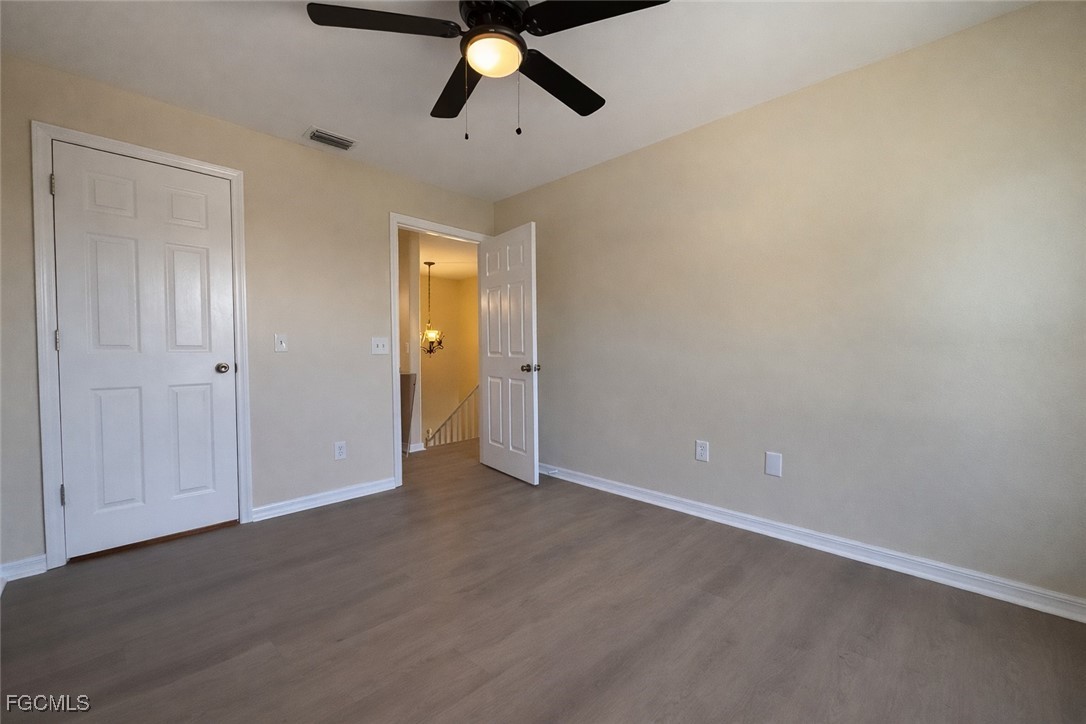 5390 Park Road, Unit 3 Fort Myers, FL 33908 - Photo 22 of 26 an empty room with closet and windows