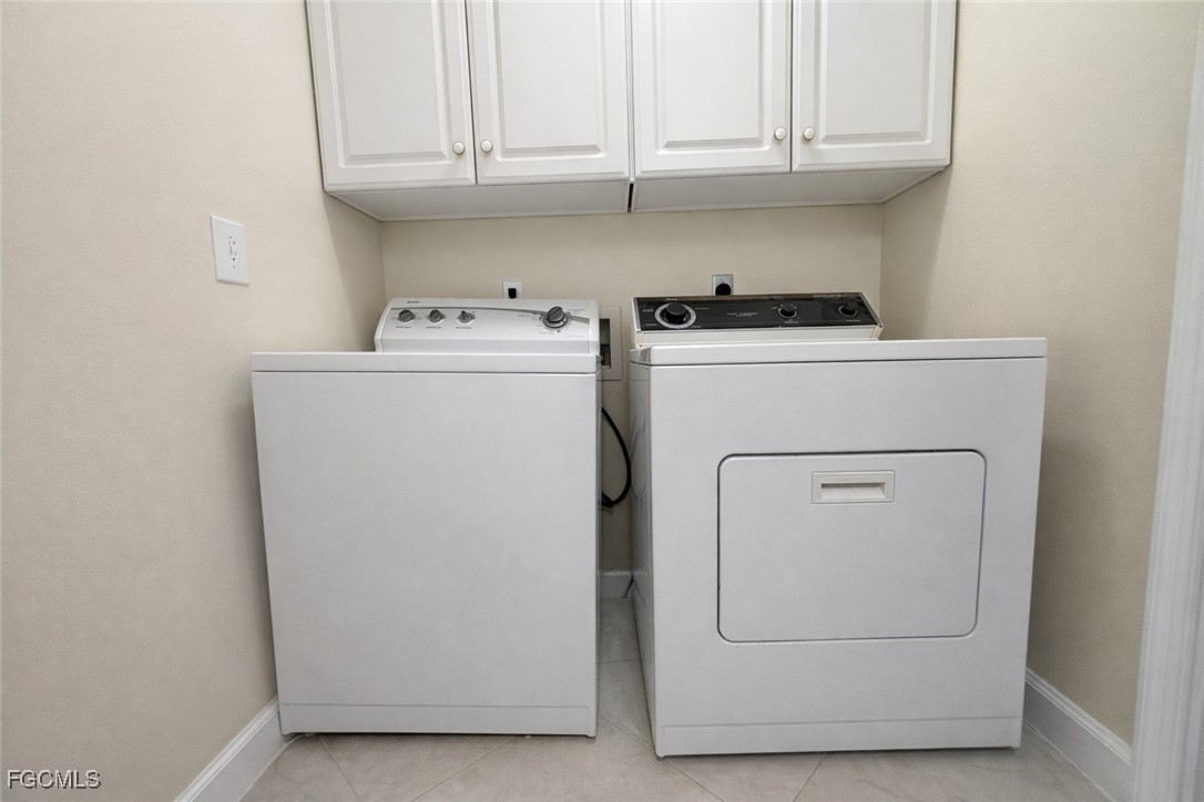 5390 Park Road, Unit 3 Fort Myers, FL 33908 - Photo 9 of 26 a utility room with dryer and washer