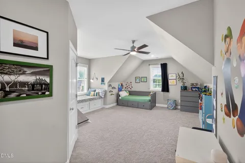 a utility room with dryer washer and sink