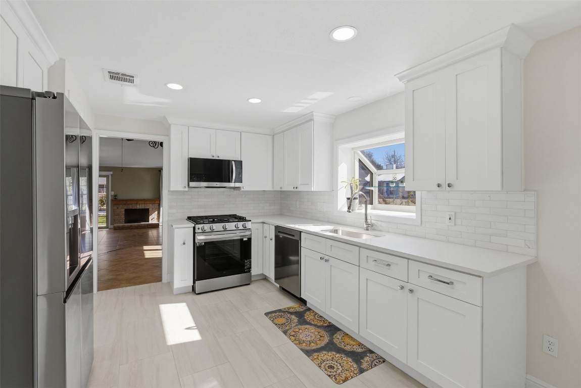 1600 East Messick Loop Round Rock, TX 78681 - Photo 13 of 38 Imagine yourself preparing meals in this remodeled kitchen!