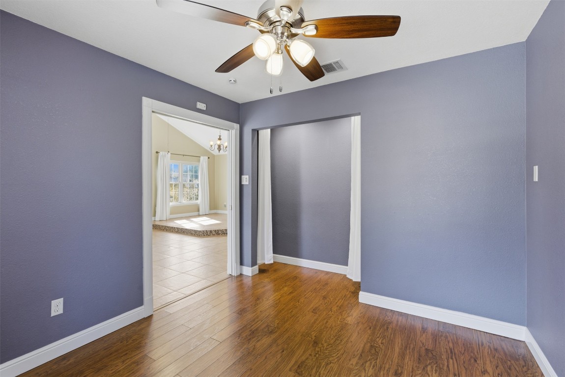 1600 East Messick Loop Round Rock, TX 78681 - Photo 20 of 38 Another view of the 3rd bedroom. The original entry was off the hallway and into the wall you see to the right of the closet, with the closet shown in it's original location.
