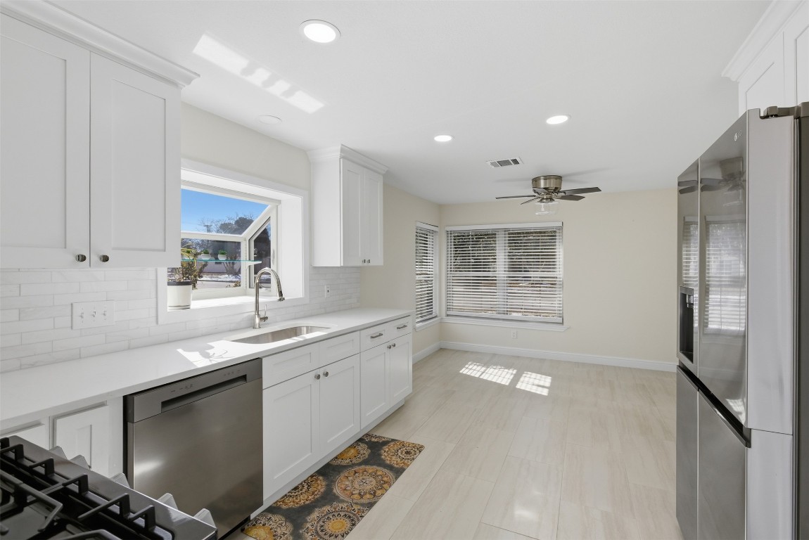 1600 East Messick Loop Round Rock, TX 78681 - Photo 2 of 38 The fully remodeled kitchen with energy saving appliances even has a breakfast area.