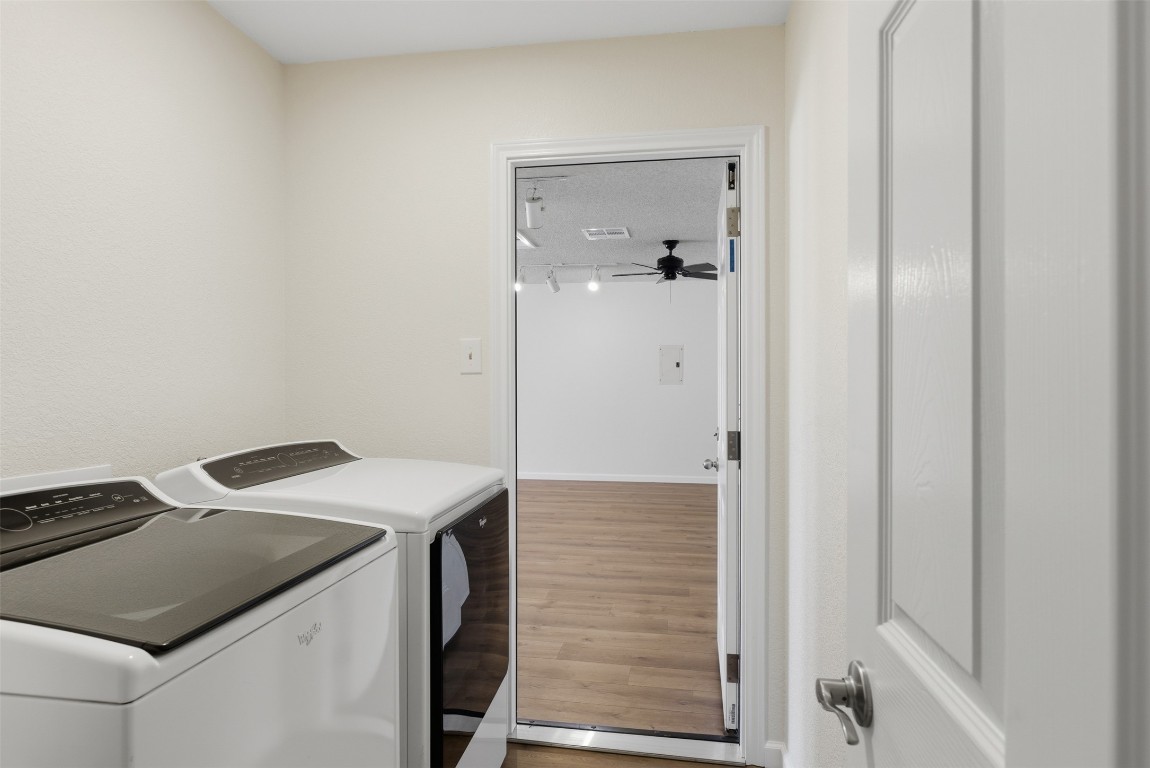 1600 East Messick Loop Round Rock, TX 78681 - Photo 28 of 38 The utility area with door leading to the converted garage.