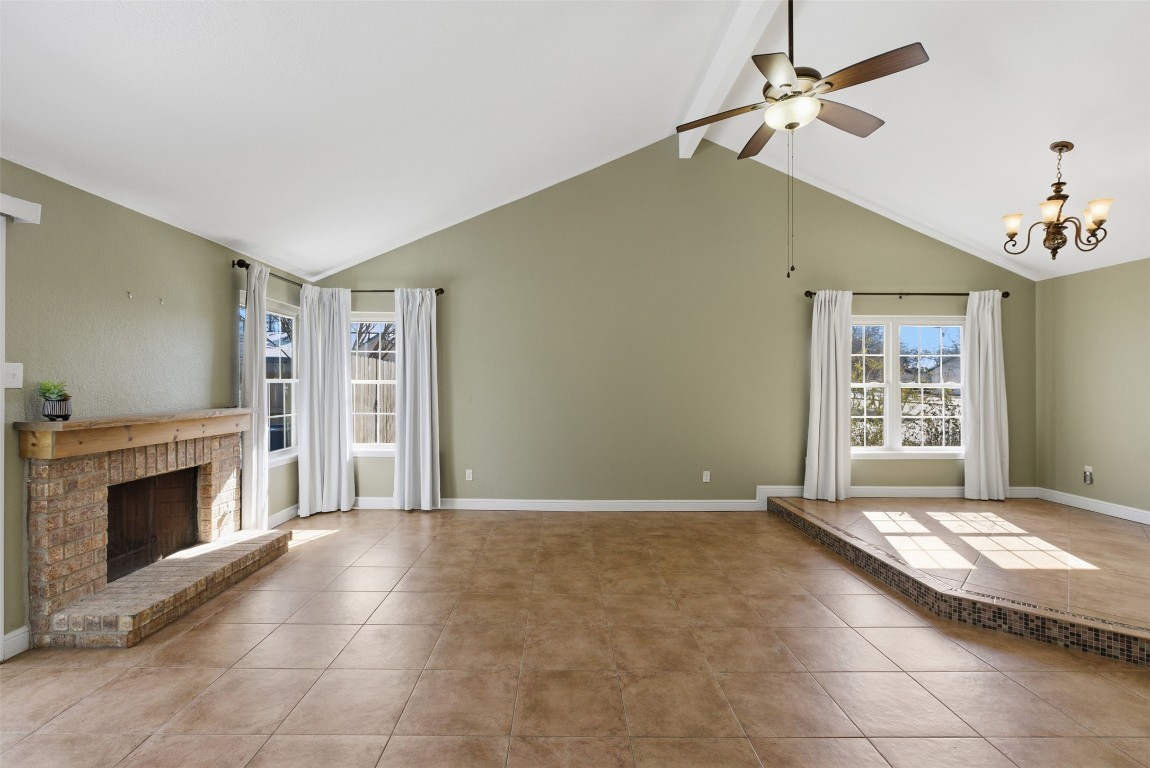 1600 East Messick Loop Round Rock, TX 78681 - Photo 3 of 38 The family room with vaulted ceiling shows the space well, complete with fireplace for those cold nights.