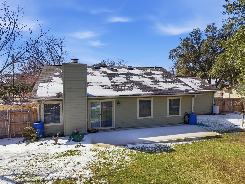 1600 East Messick Loop Round Rock, TX 78681 - Photo 33 of 38 The back of the home with hardiplank siding has an extended patio that runs the length of the rear as shown in the photo.