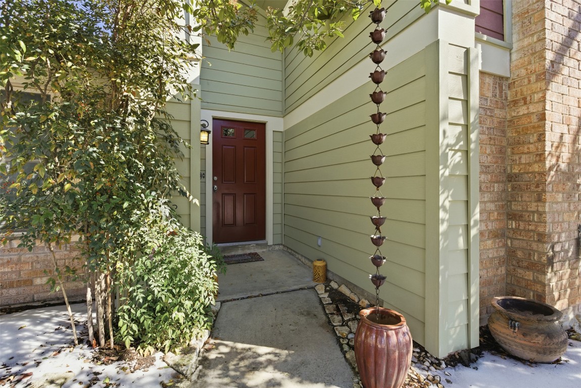 1600 East Messick Loop Round Rock, TX 78681 - Photo 6 of 38 The porch entry to this lovely home - hardi siding and brick for easy maintenance.