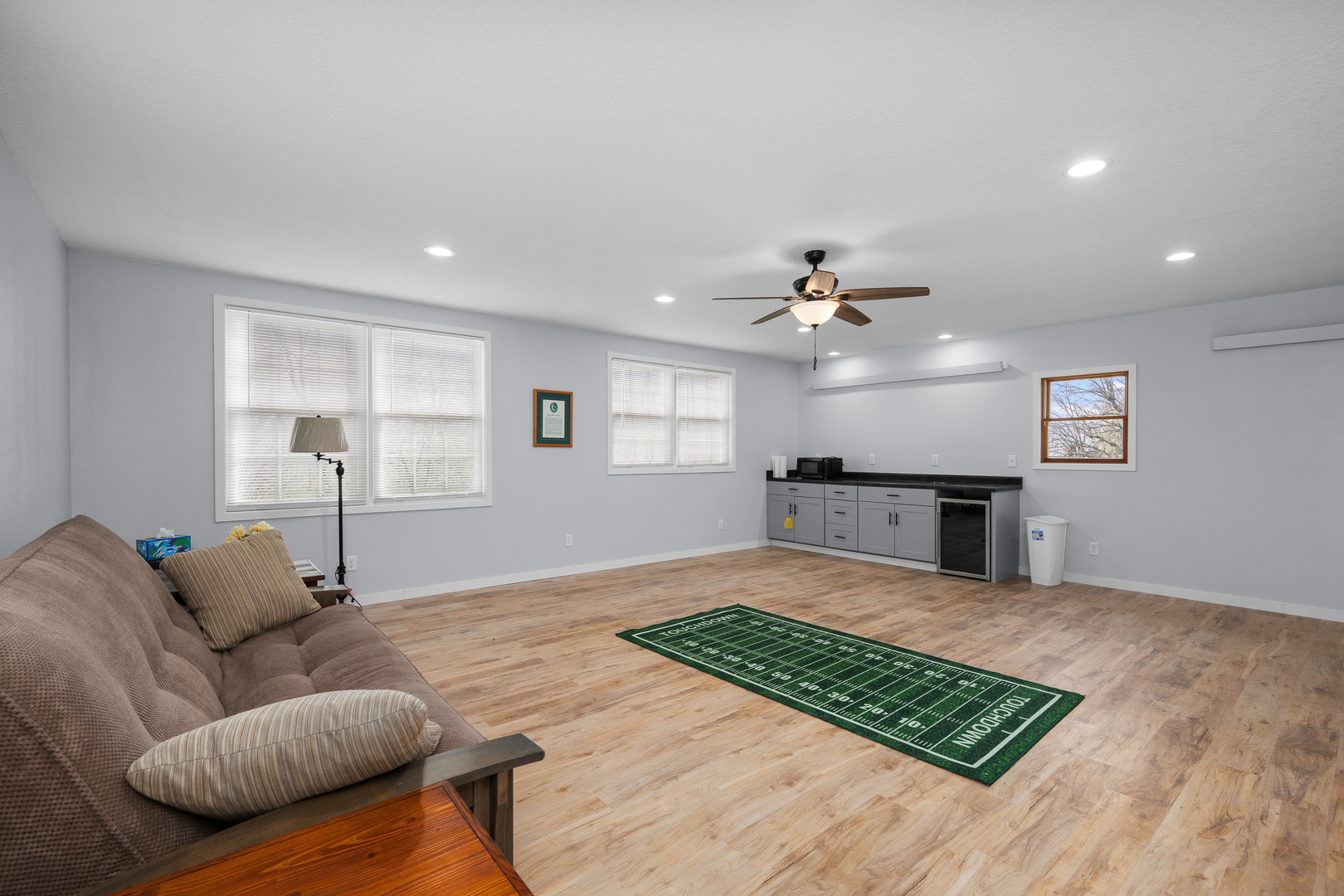 317 South Walnut Street Wilton, IA 52778 - Photo 26 of 45 a living room with furniture and a table