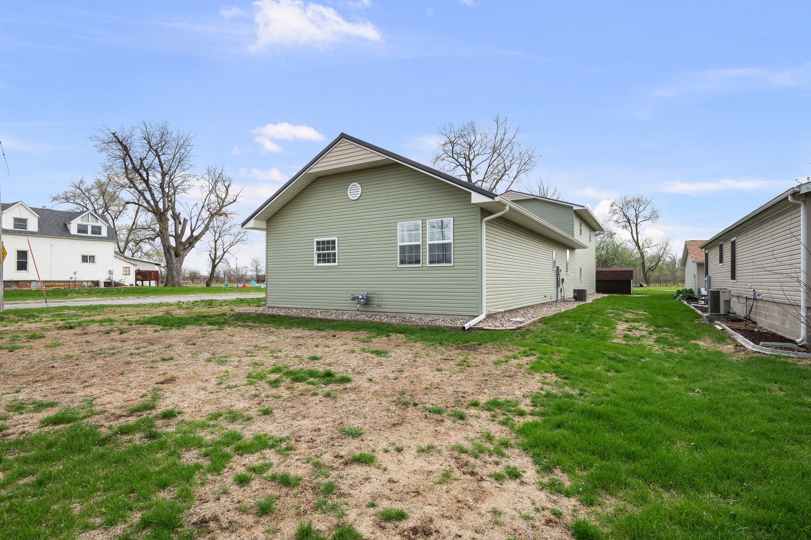 317 South Walnut Street Wilton, IA 52778 - Photo 36 of 45 a view of a house with a yard
