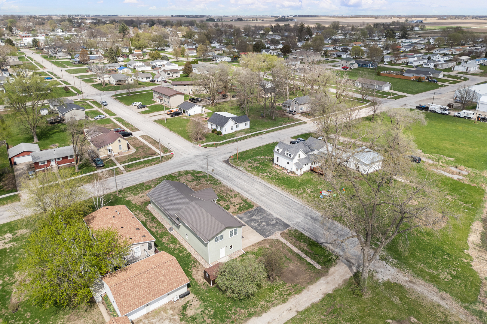 317 South Walnut Street Wilton, IA 52778 - Photo 41 of 45 an aerial view of a house with a lake view