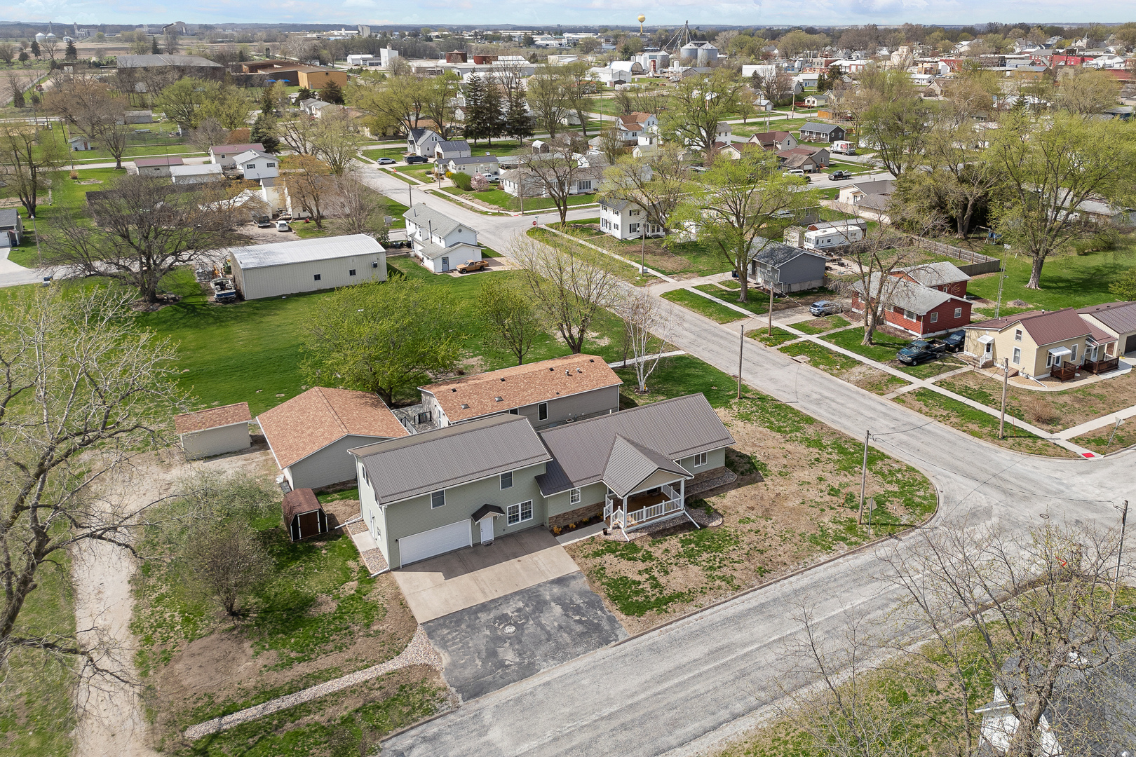 317 South Walnut Street Wilton, IA 52778 - Photo 42 of 45 an aerial view of a house with a garden