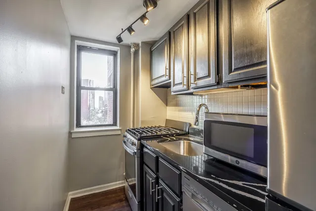 a balcony view with a seating space