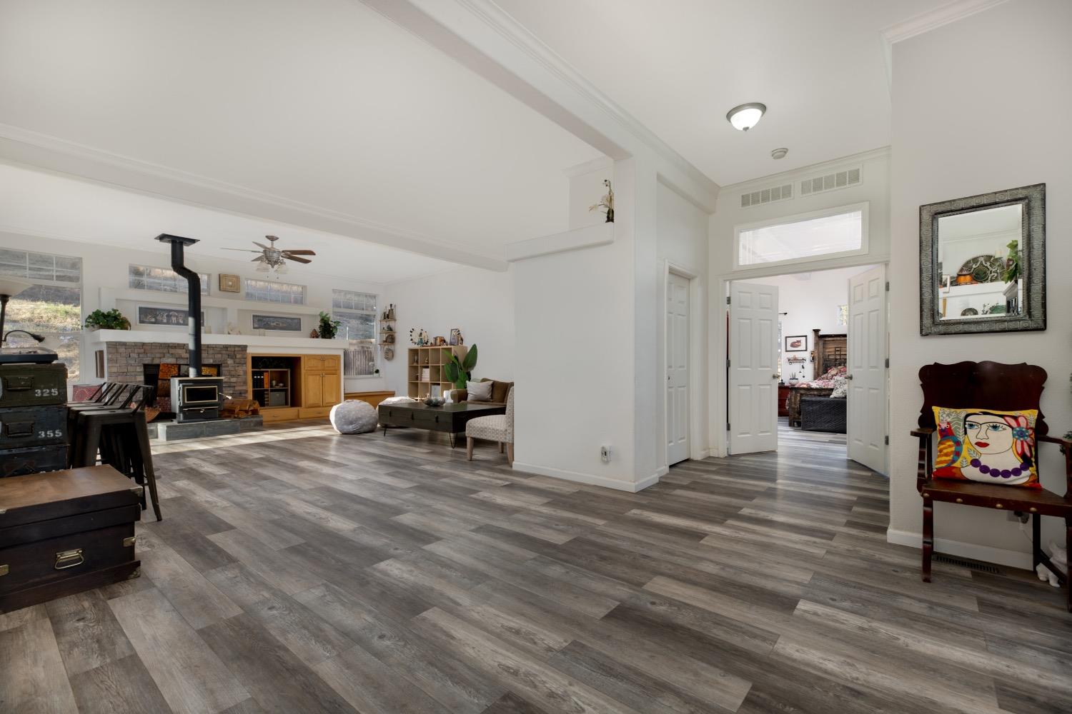 24090 Restive Way Grass Valley, CA 95949 - Photo 15 of 75 a living room with furniture and a fireplace