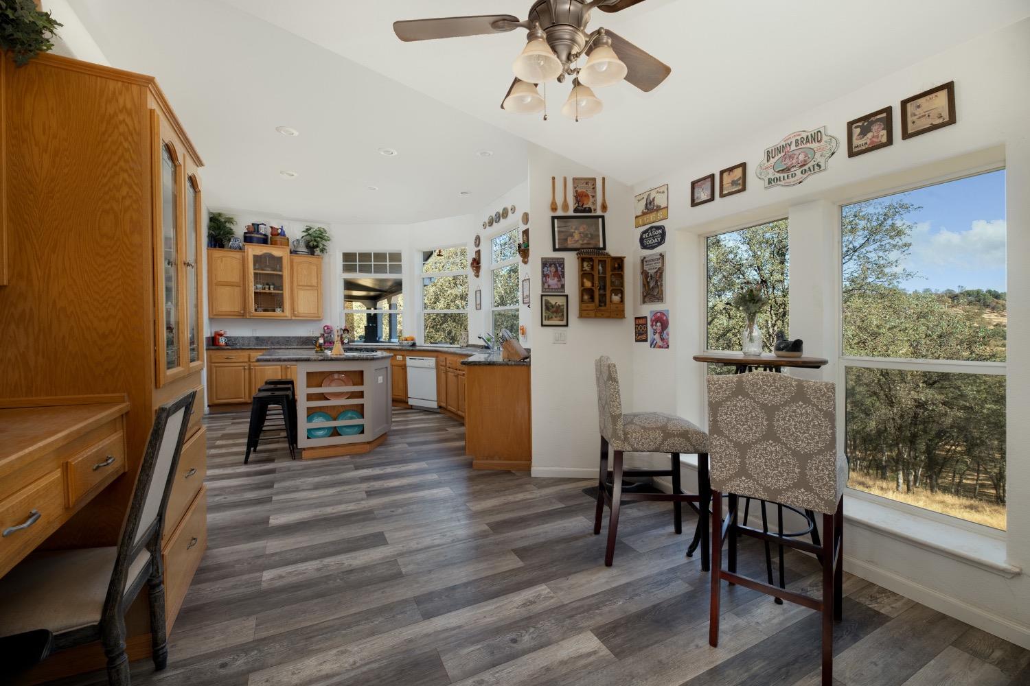 24090 Restive Way Grass Valley, CA 95949 - Photo 28 of 75 a living room with furniture and a wooden floor