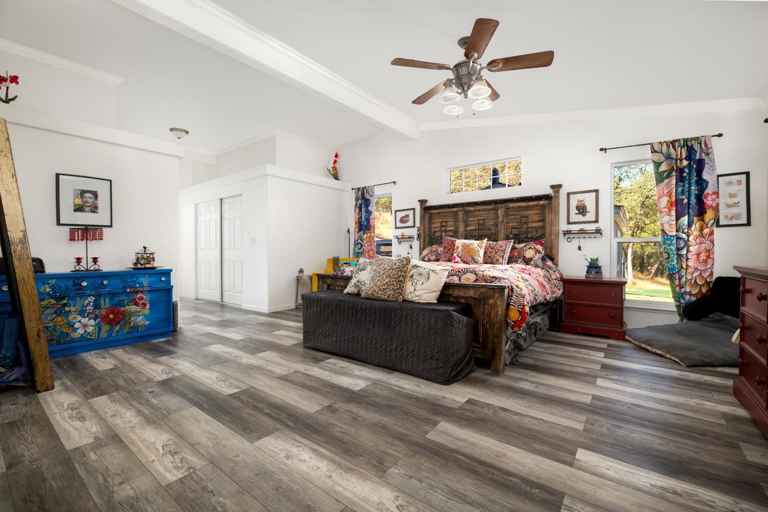 24090 Restive Way Grass Valley, CA 95949 - Photo 32 of 75 a bed room with furniture and a flat screen tv