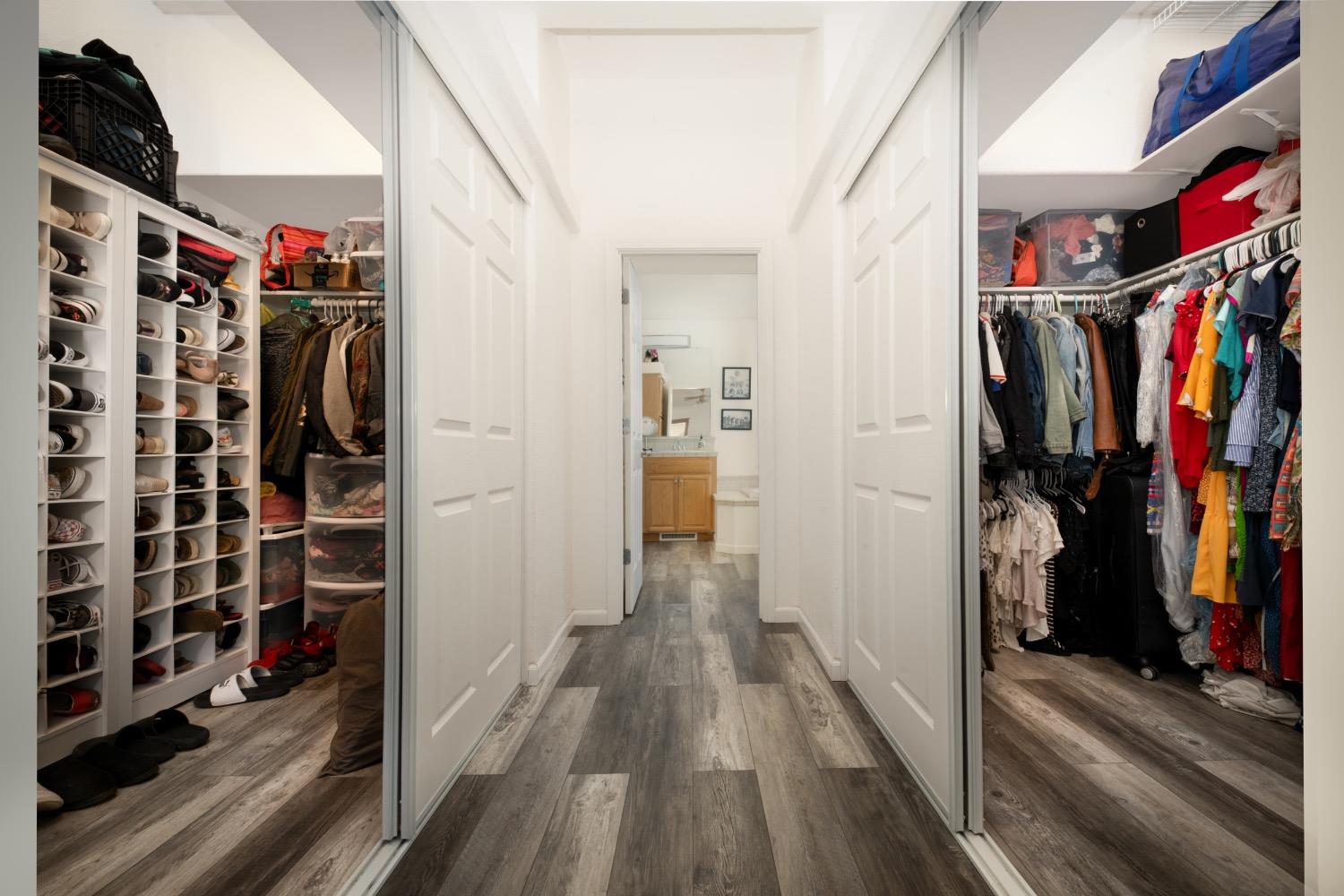 24090 Restive Way Grass Valley, CA 95949 - Photo 33 of 75 a view of walk in closet with clothes and shoes