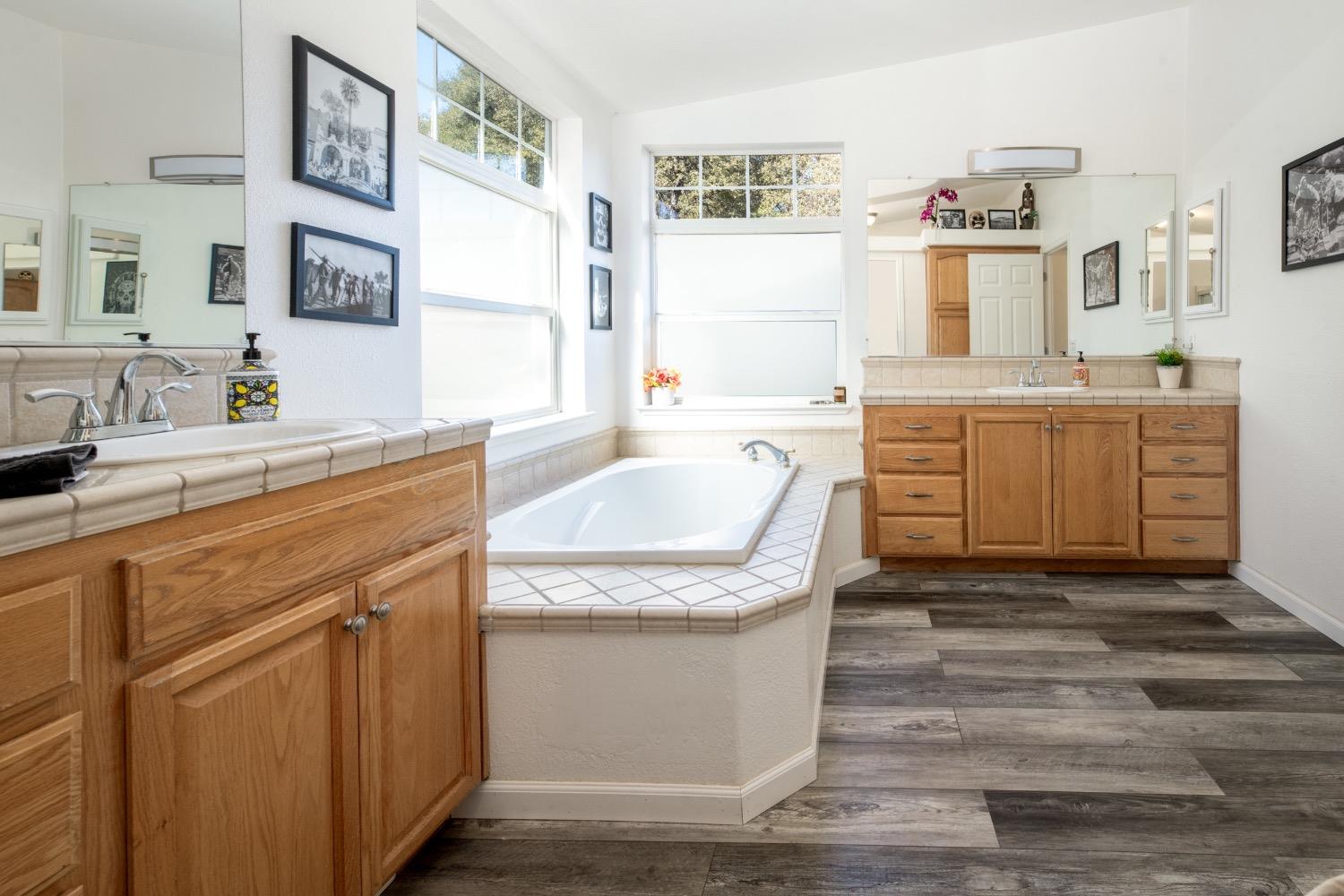 24090 Restive Way Grass Valley, CA 95949 - Photo 35 of 75 a kitchen with granite countertop a sink and dishwasher stove top oven