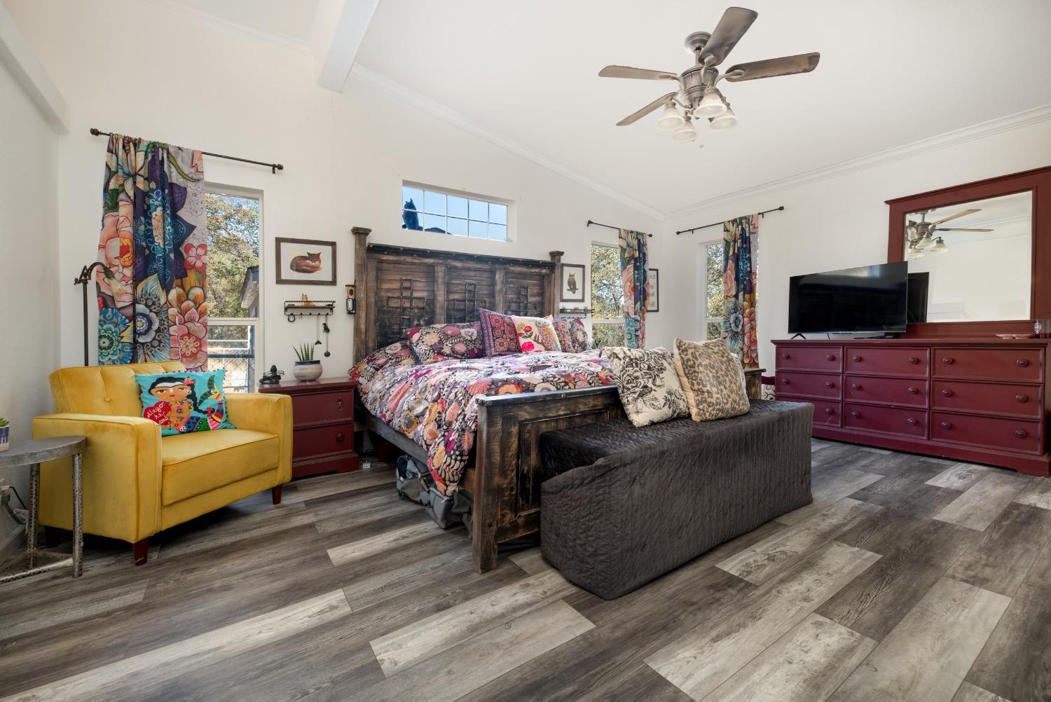 24090 Restive Way Grass Valley, CA 95949 - Photo 38 of 75 a bedroom with bed and a flat screen tv