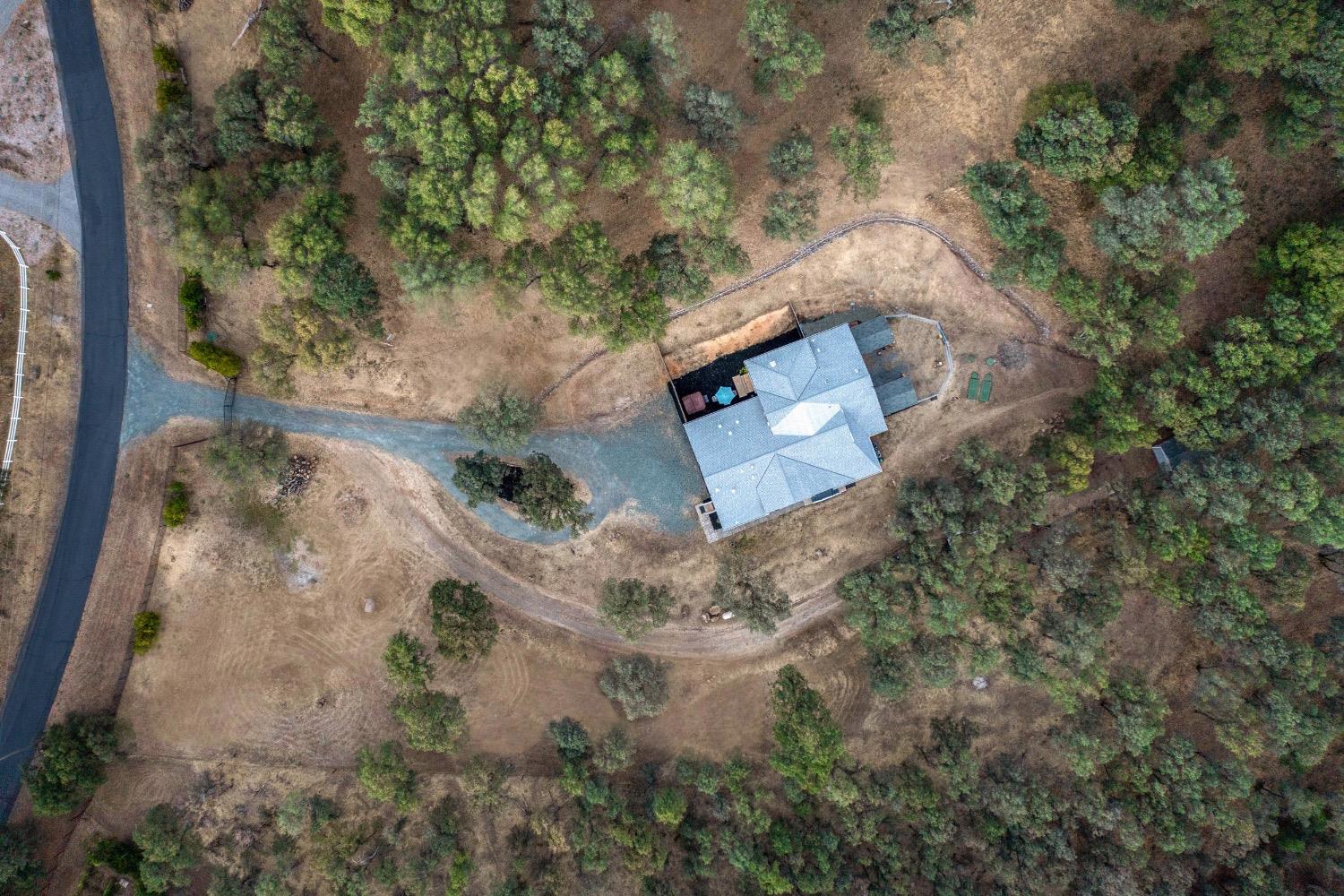 24090 Restive Way Grass Valley, CA 95949 - Photo 65 of 75 an aerial view of a house with a yard