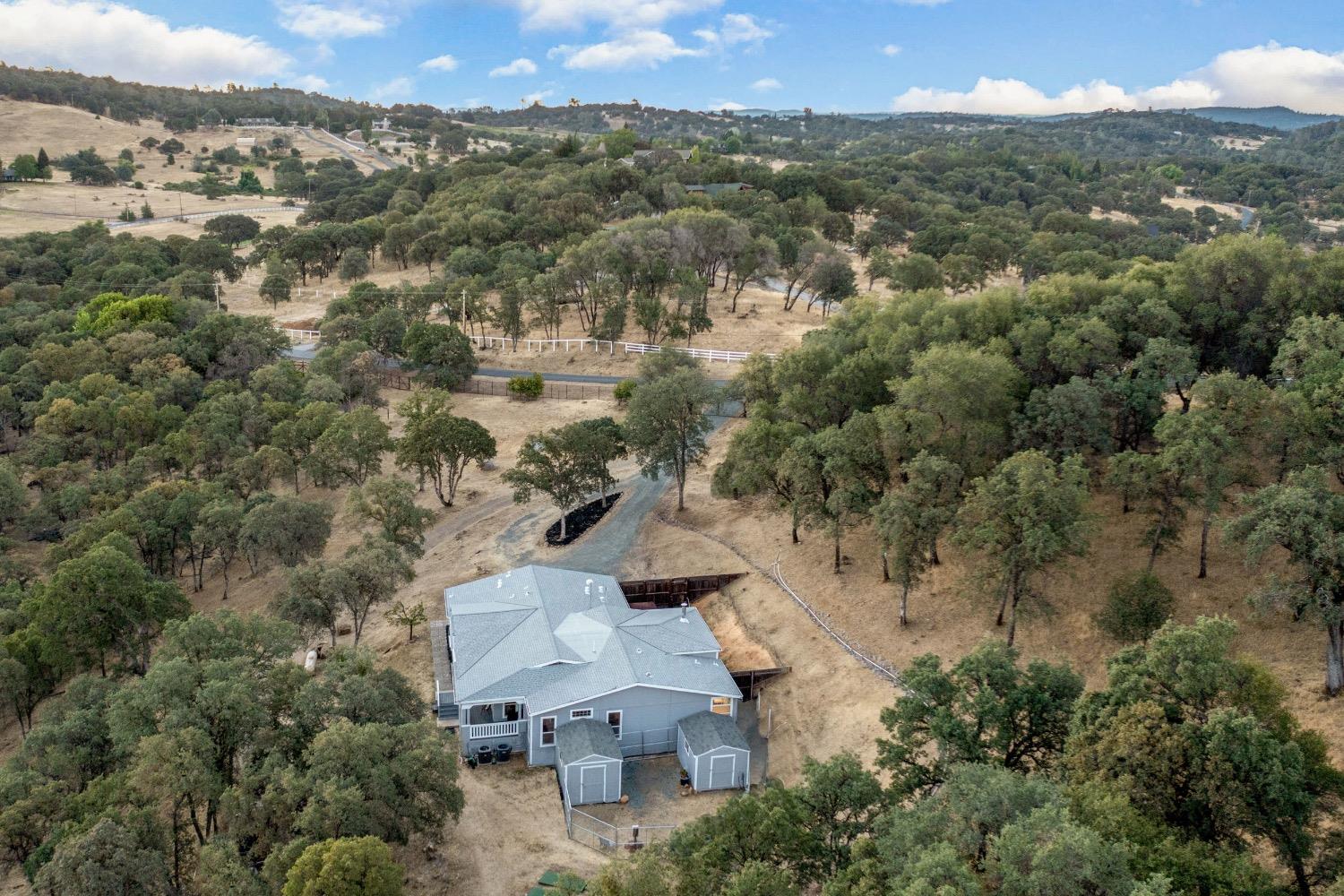 24090 Restive Way Grass Valley, CA 95949 - Photo 66 of 75 an aerial view of a house with a yard