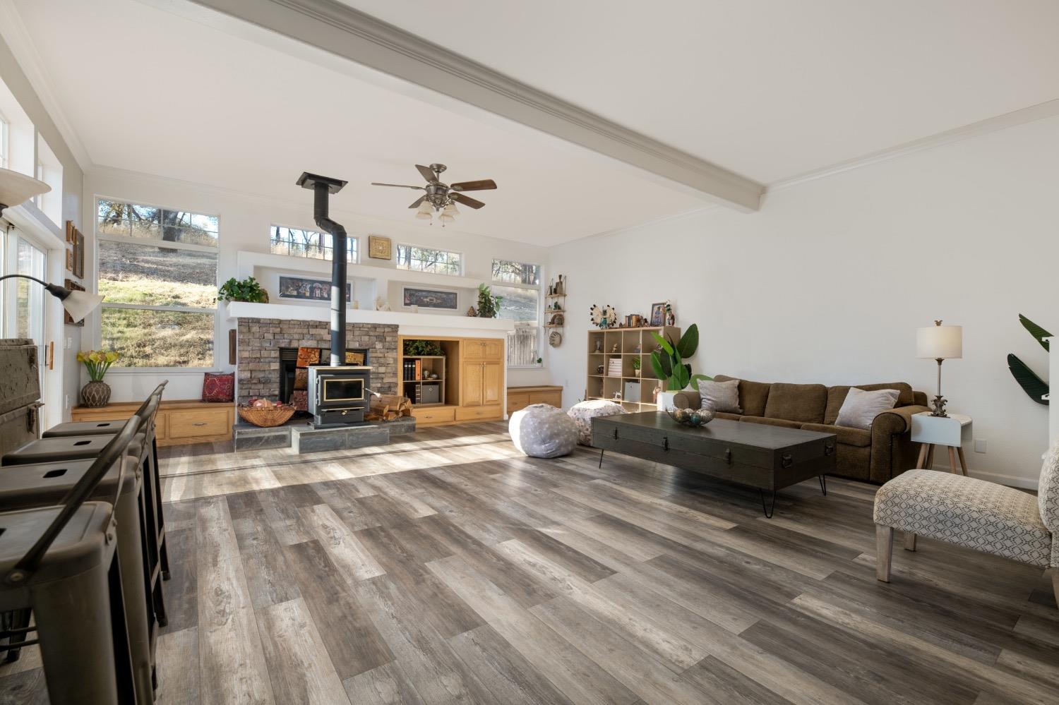24090 Restive Way Grass Valley, CA 95949 - Photo 8 of 75 a living room with furniture and a fireplace