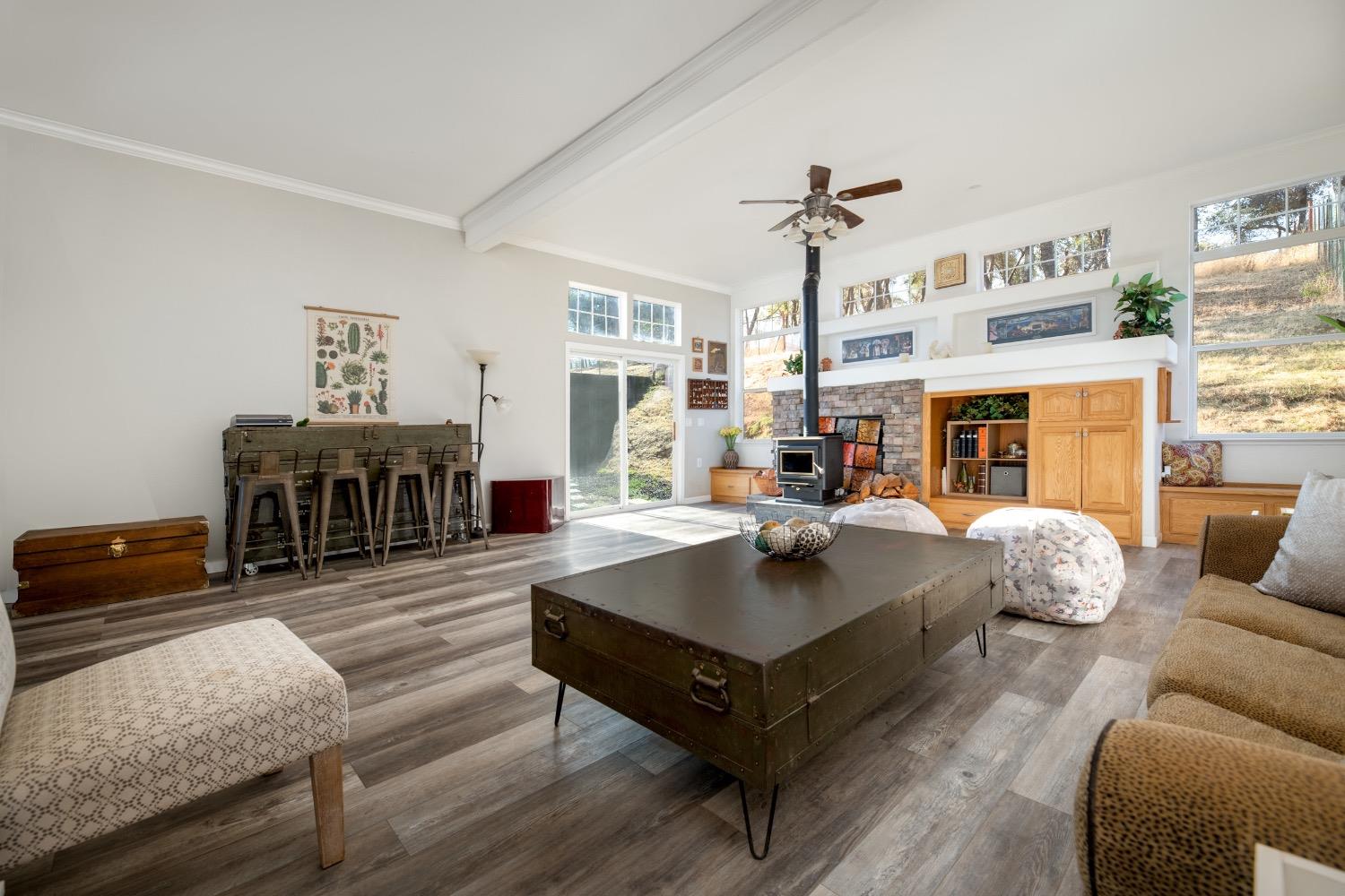 24090 Restive Way Grass Valley, CA 95949 - Photo 9 of 75 a living room with furniture and wooden floor