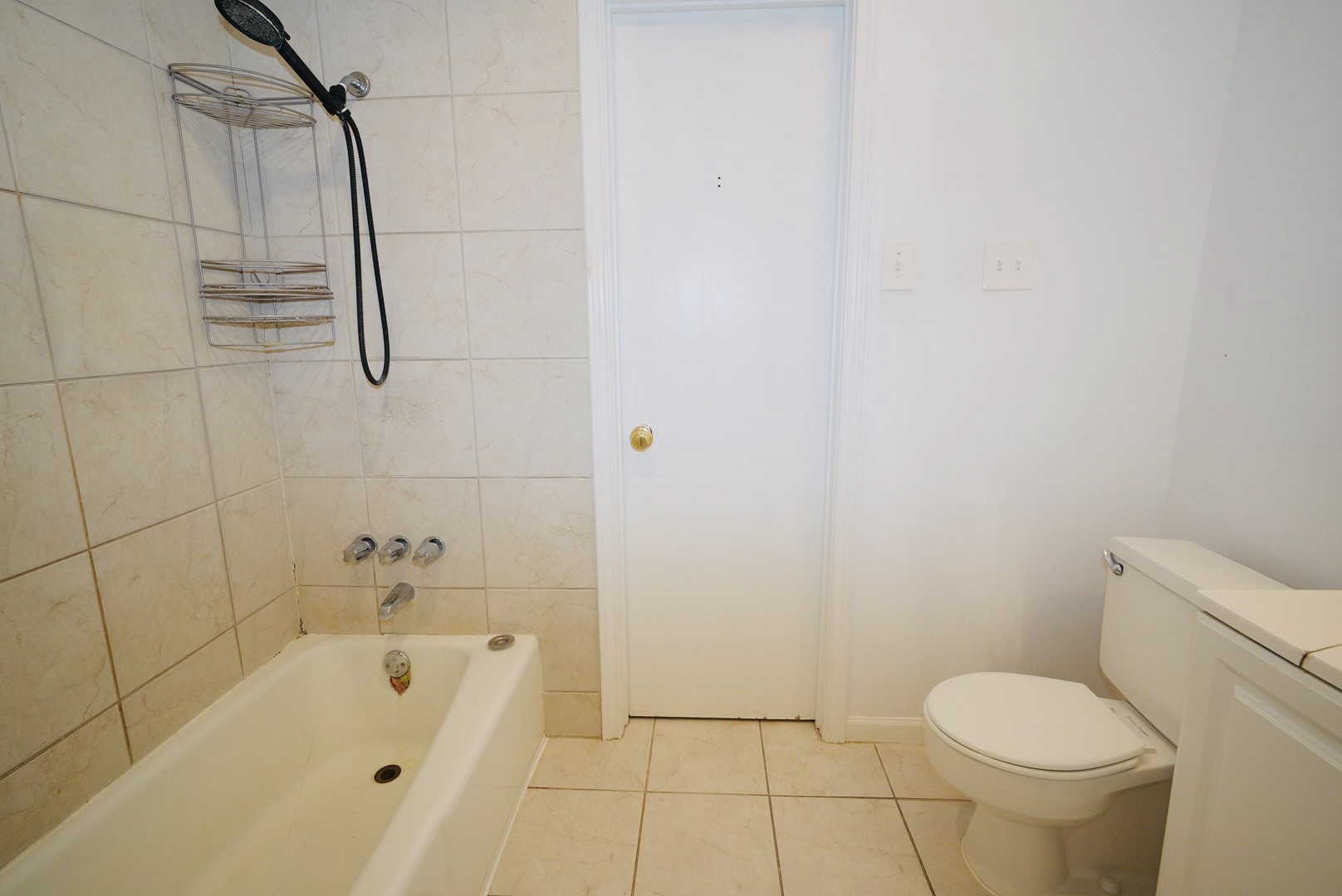 7600 Burgoyne Road, Unit 250 Houston, TX 77063 - Photo 10 of 14 Step into this inviting entrance featuring sleek wood flooring and a bright, airy ambiance, offering seamless access to a cozy balcony through sliding doors.