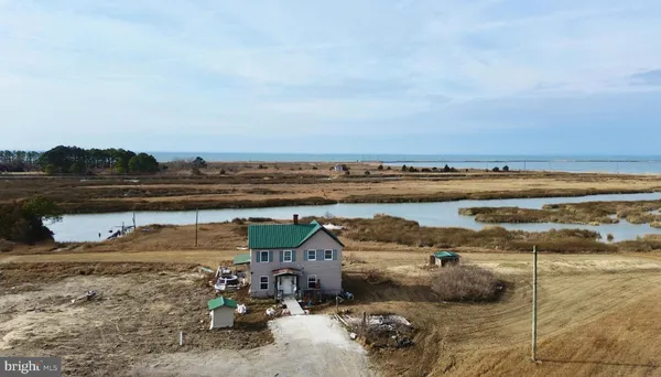 a view of a lake with a car parked