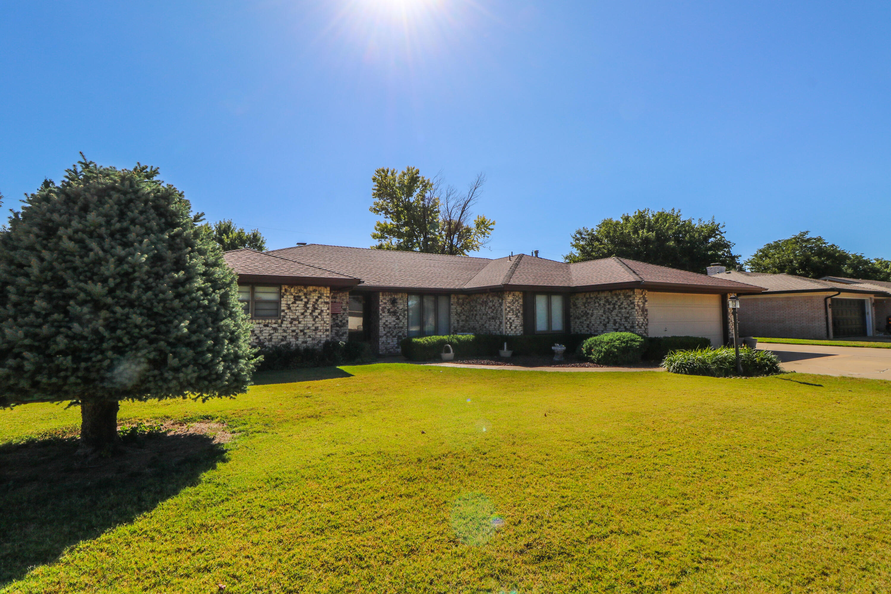 232 East 26th Street Littlefield, TX 79339 - Photo 2 of 26 a front view of a house with swimming pool