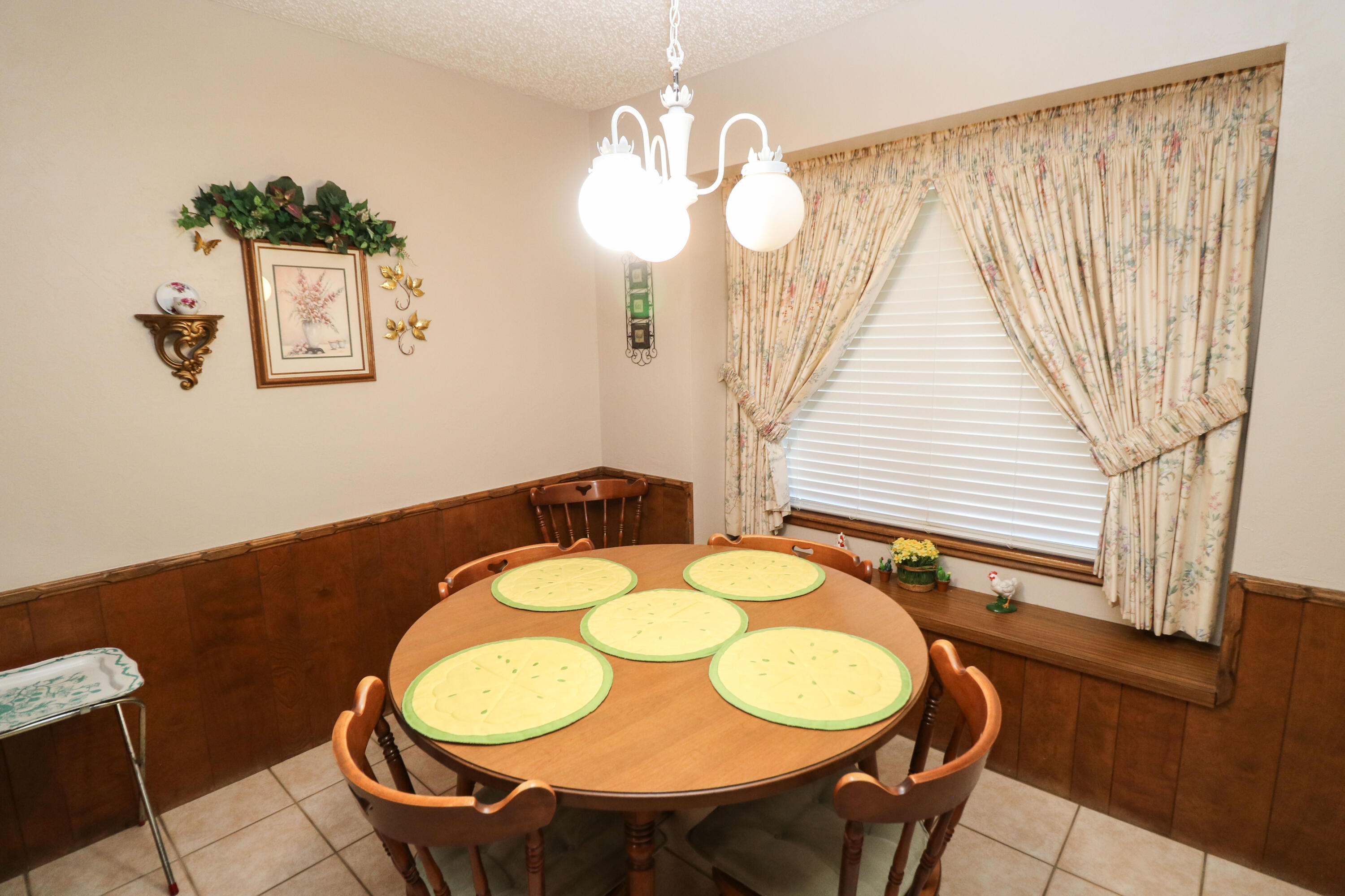 232 East 26th Street Littlefield, TX 79339 - Photo 10 of 26 a view of a dining room with furniture and wooden floor