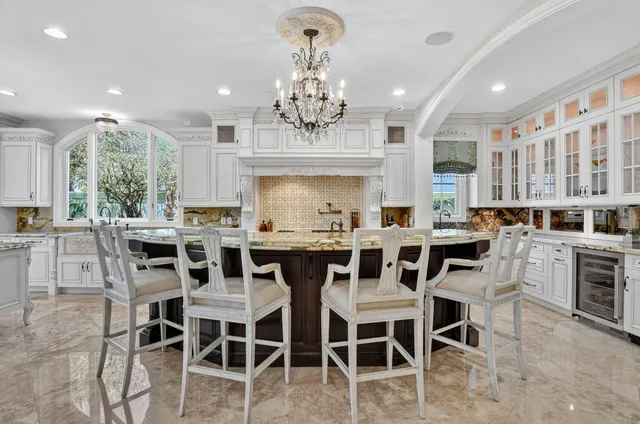 a bedroom with furniture and a wooden floor