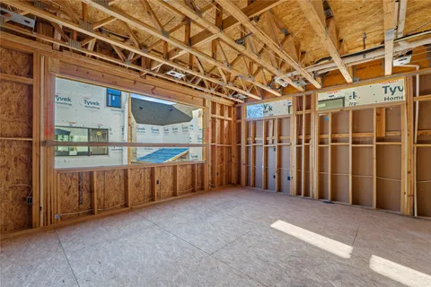 a view of a room with wooden walls