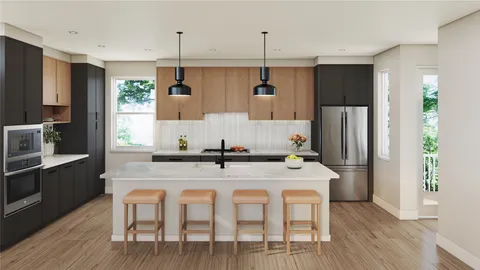 a kitchen with a dining table and chairs