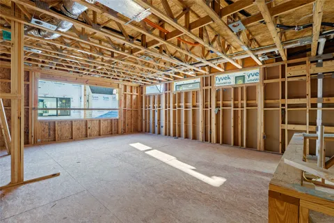 a view of a room with wooden walls