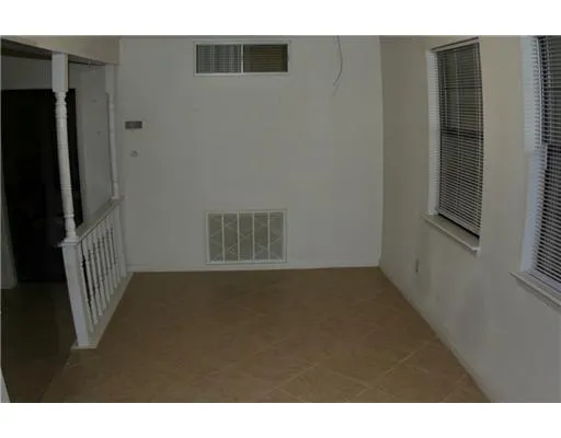 a black and white photo of a living room