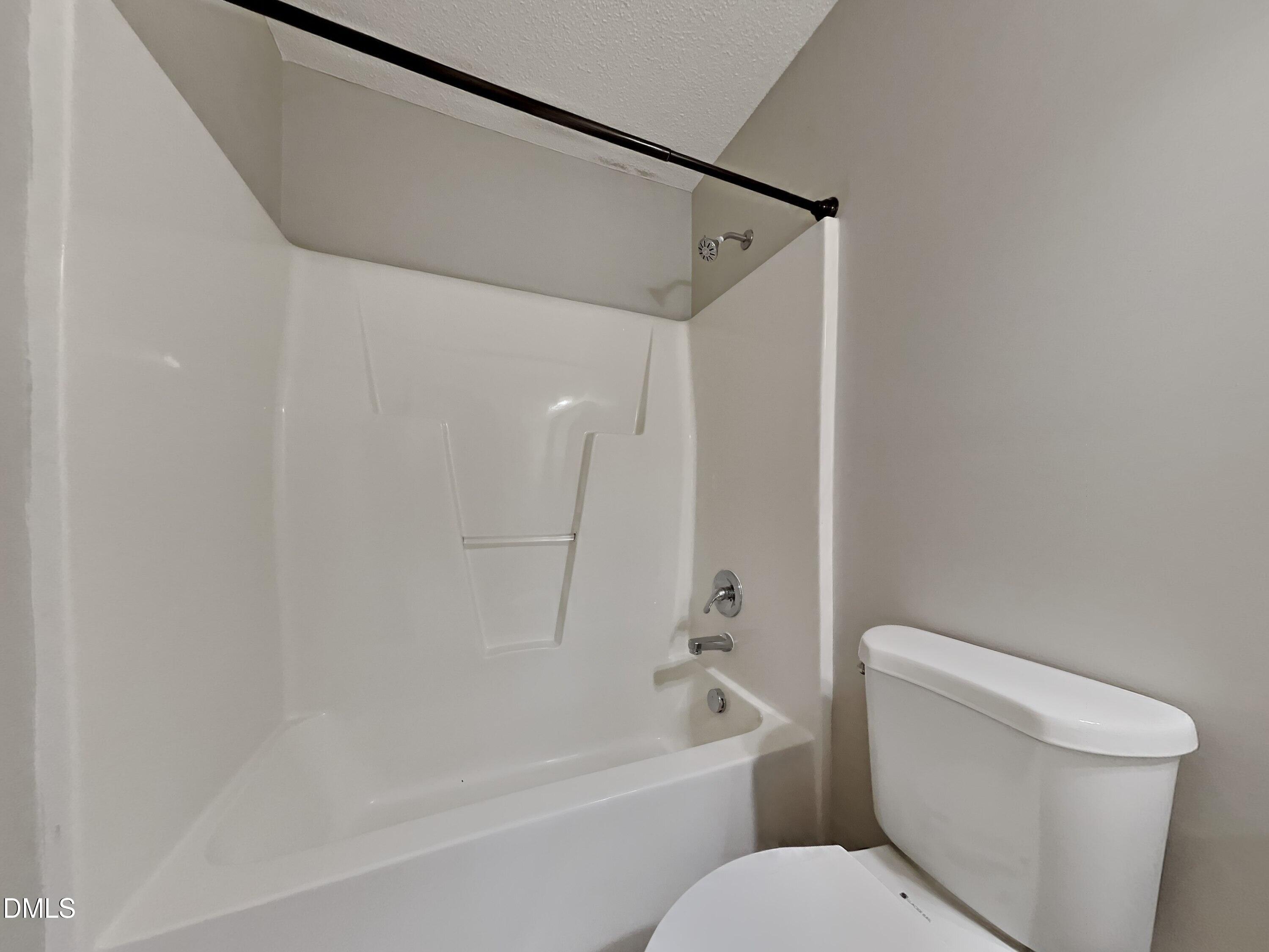226 Linden Road Cameron, NC 28326 - Photo 15 of 20 a white toilet sitting next to a bath tub